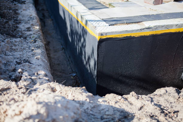 Professional Interior Drainage System technician working in Hainesport, NJ